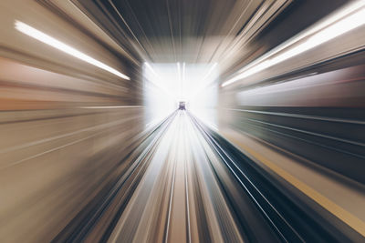 Blurred motion of illuminated railroad tracks