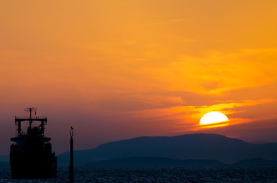 Scenic view of mountains at sunset