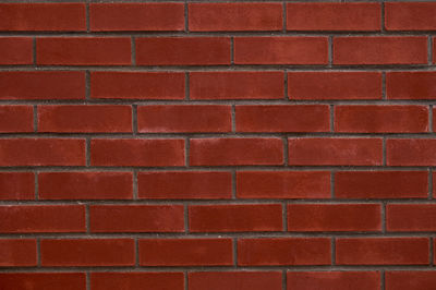 Full frame shot of red brick wall