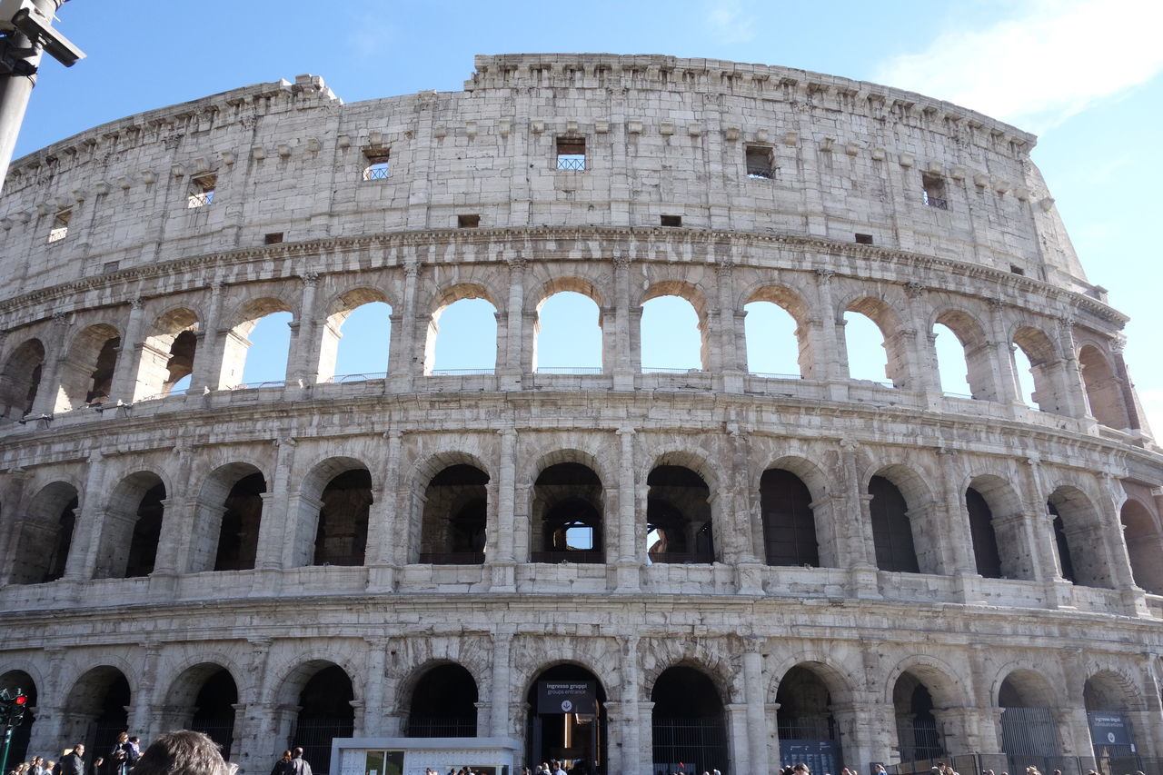 architecture, history, built structure, famous place, tourism, travel destinations, international landmark, ancient, old ruin, building exterior, coliseum, arch, ancient civilization, travel, the past, culture, amphitheater, low angle view, unesco world heritage site, old