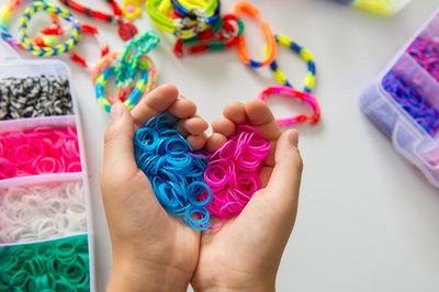 Cropped hand of woman holding gift