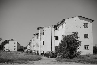 Residential buildings against clear sky