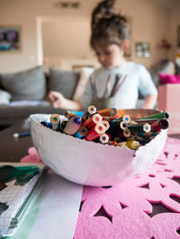 Close-up of boy with toys on table