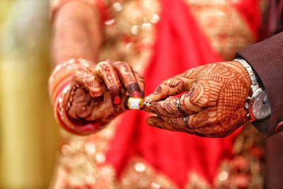 Close-up of hand holding hands