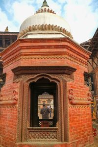 Low angle view of built structure against sky