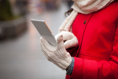 Close-up of person holding mobile phone