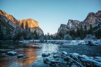 Scenic view of mountains against sky during winter