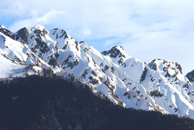 Scenic view of snowcapped mountain against sky