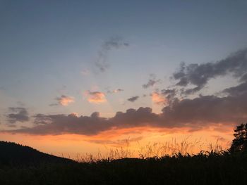 Scenic view of dramatic sky during sunset