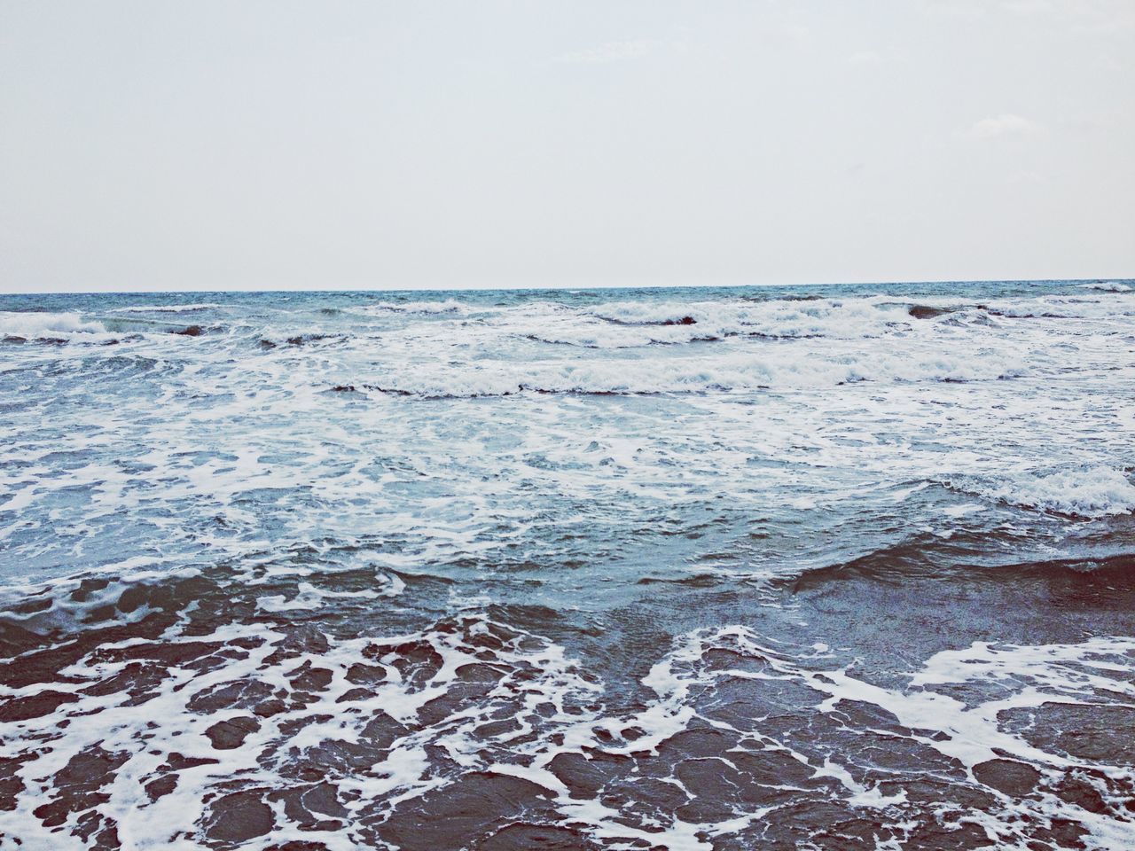 sea, water, horizon over water, clear sky, scenics, wave, beauty in nature, tranquil scene, tranquility, beach, copy space, surf, nature, shore, idyllic, seascape, rippled, sky, remote, motion