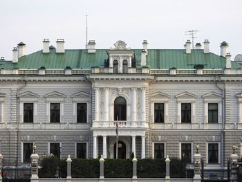 Low angle view of buildings against clear sky