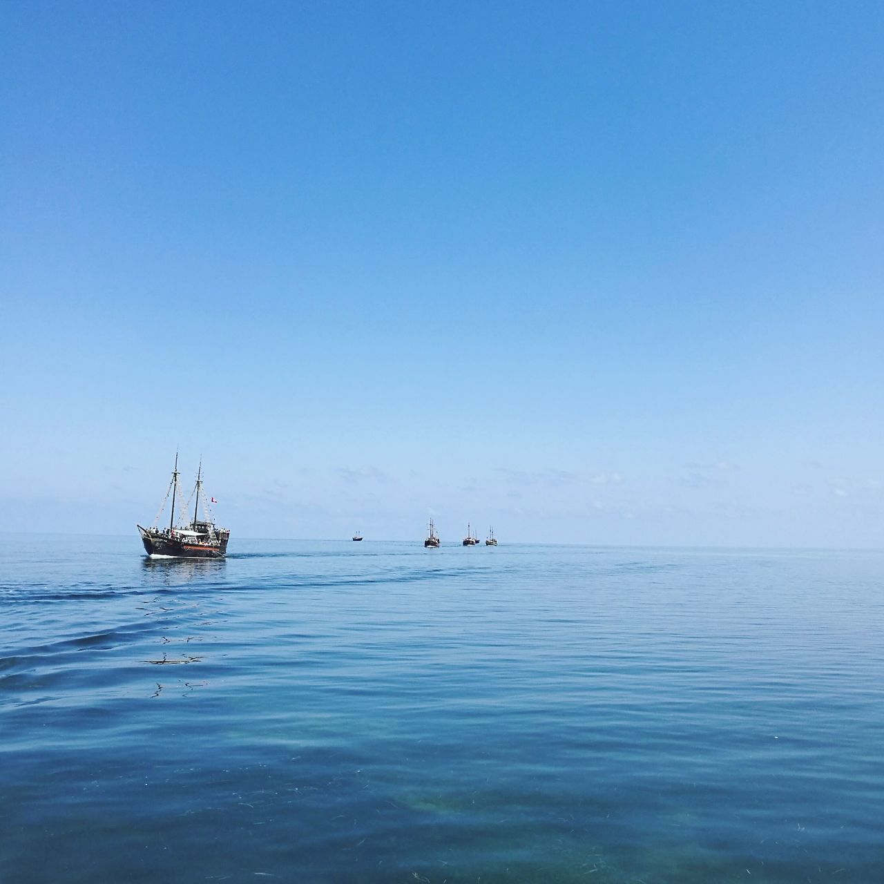 water, sea, nautical vessel, horizon over water, copy space, blue, transportation, boat, clear sky, waterfront, tranquil scene, tranquility, rippled, scenics, calm, beauty in nature, seascape, nature, ocean, sailing, journey, non-urban scene, no people