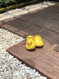 High angle view of yellow toy on table