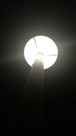 Low angle view of illuminated light bulb