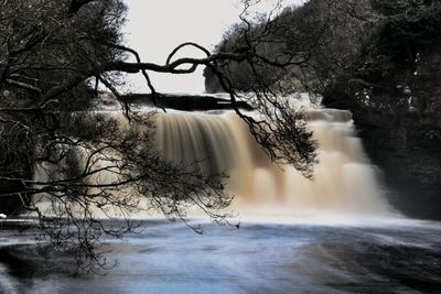 Scenic view of waterfall in winter