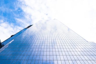 Low angle view of skyscraper against sky