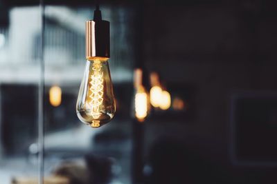 Close-up of glowing electric bulb