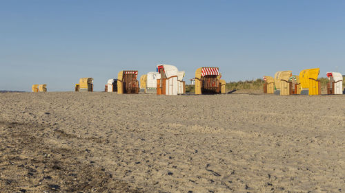 Panoramic view of beach against clear sky