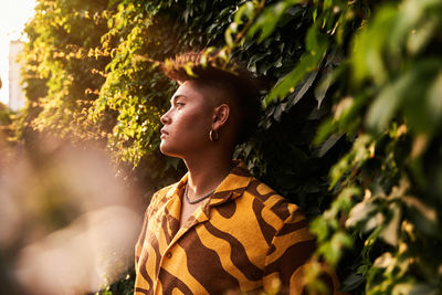 Side view of young man looking away