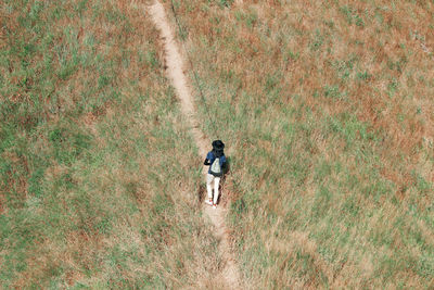 High angle view of man walking on mountain