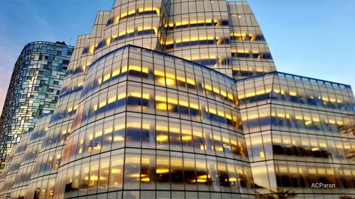 Low angle view of modern building against sky