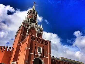 Low angle view of built structure against cloudy sky