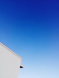 Low angle view of built structure against blue sky