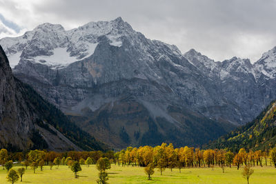 Scenic view of snowcapped mountains against sky