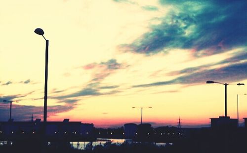 Silhouette of building at sunset