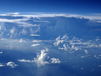 Aerial view of cloudscape over sea against sky