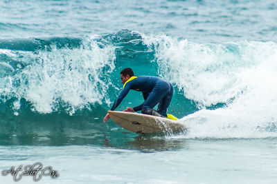 Man surfing in sea