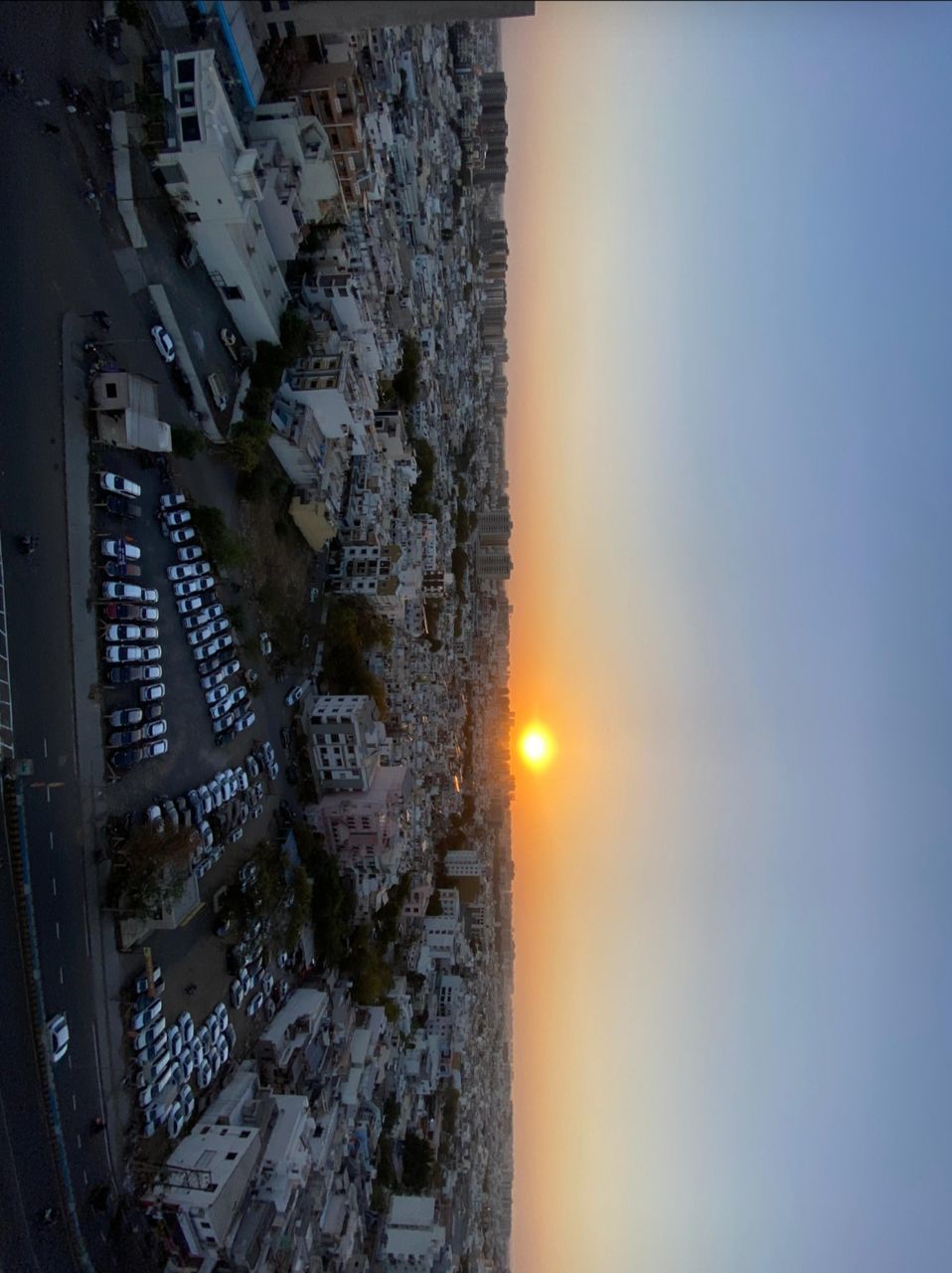 sky, architecture, city, building exterior, built structure, reflection, nature, sunset, no people, light, screenshot, building, space, cityscape, outdoors, transportation, illuminated, skyscraper