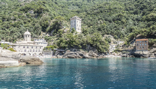 The beautiful bay of san fruttuoso with green water and an abbey near the beach