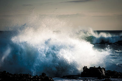 Sea waves against sky