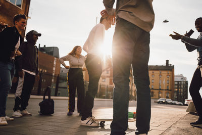 People walking on street in city