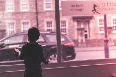 Woman walking on city street