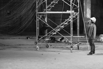 Worker standing at construction site