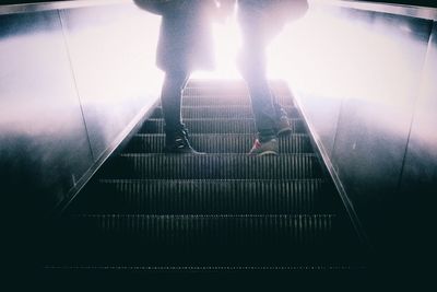 People on escalator