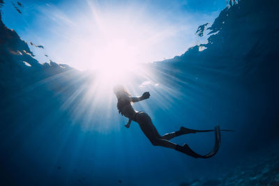 Man swimming in sea