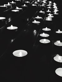 Close-up of illuminated lights on table