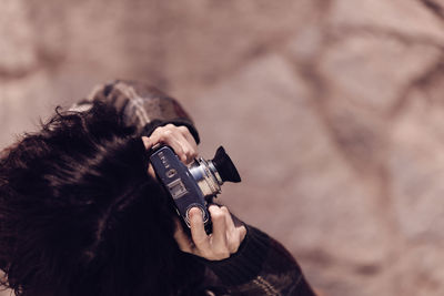 Man photographing with camera