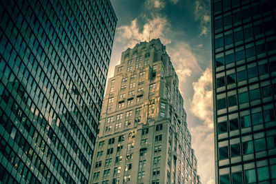 Low angle view of modern buildings against sky