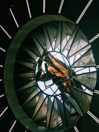 Low angle view of illuminated ferris wheel