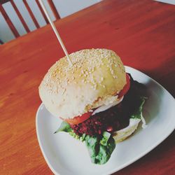 High angle view of burger in plate on table