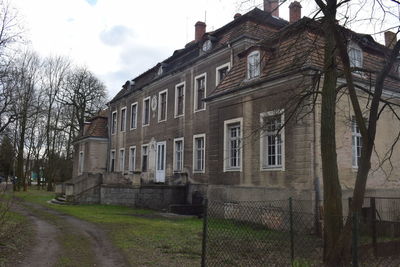 Low angle view of old building against sky