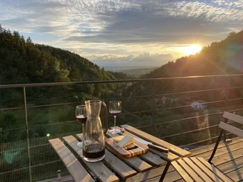Panoramic shot of food on table against sky during sunset