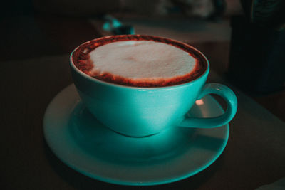 Close-up of coffee cup on table