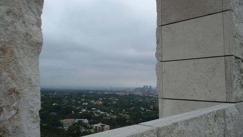 Close-up of cityscape against sky