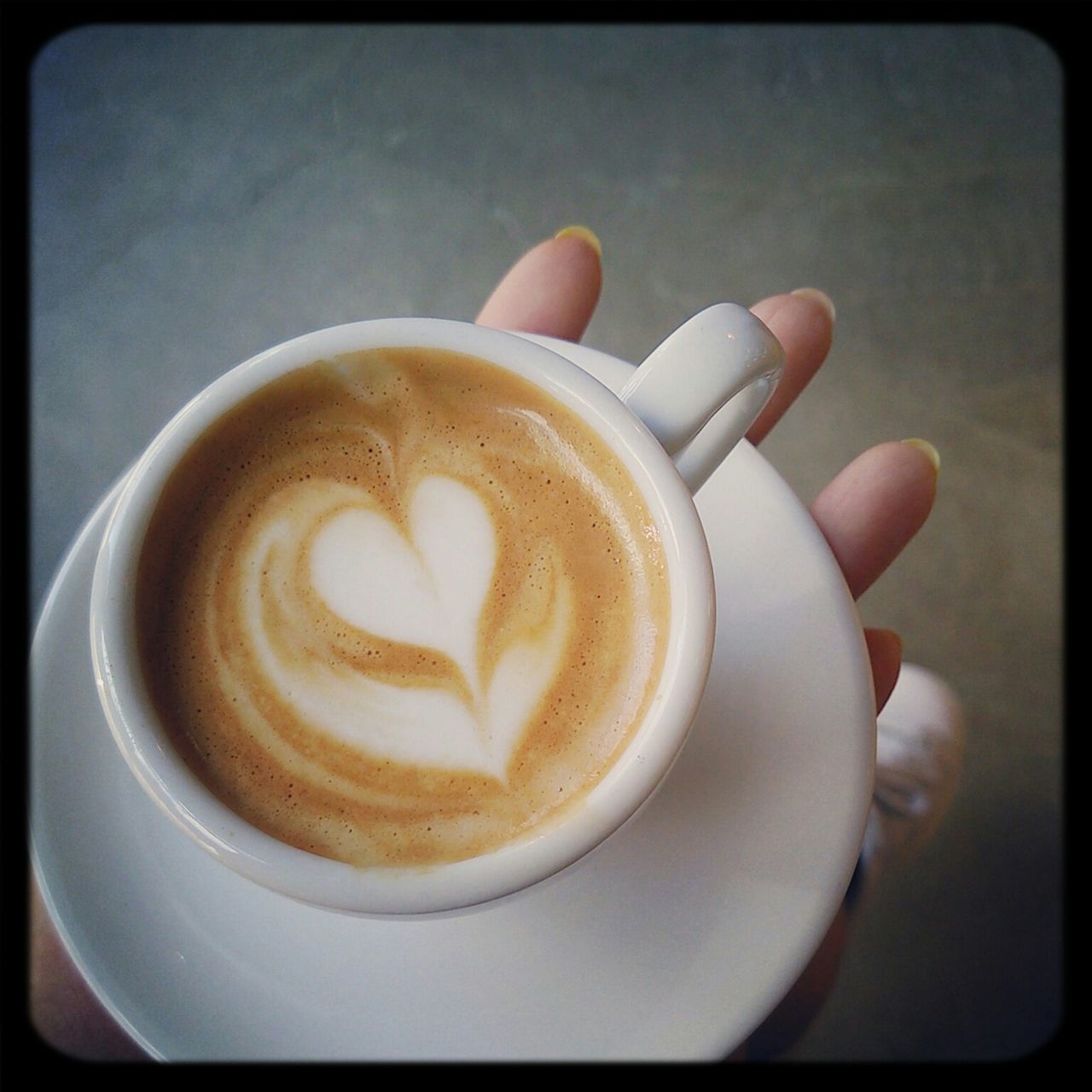 coffee cup, food and drink, coffee - drink, refreshment, drink, indoors, cappuccino, froth art, saucer, frothy drink, freshness, coffee, table, still life, close-up, high angle view, spoon, cup, transfer print, latte