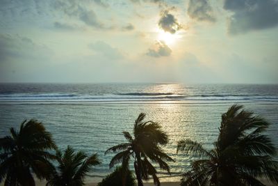 Scenic view of sea against sky at sunset